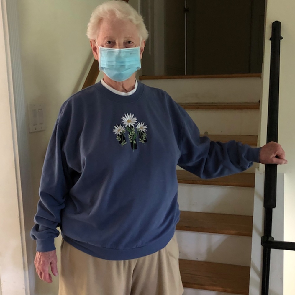 dark blue sweatshirt with daisy design